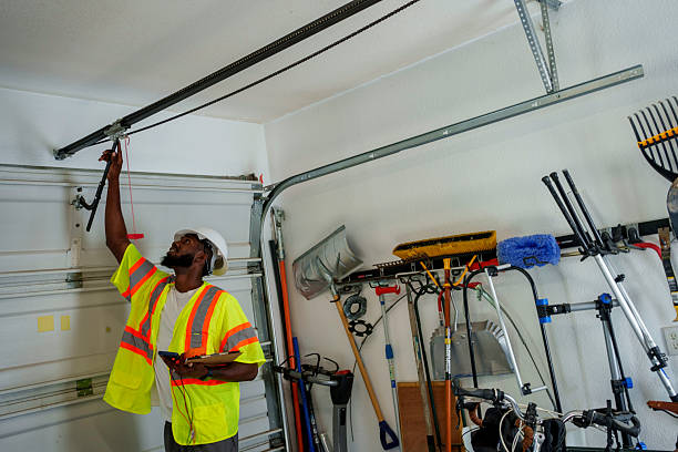 Professional Garage Door Installation technician working in Gibson City, IL